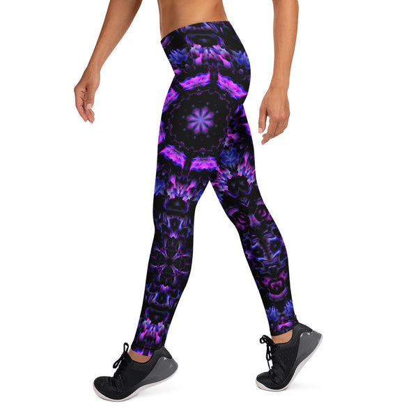 Photograph of a model wearing a unisex Bleace MetaParty Vibes Kaleidoscopic purple, blue, and pink, Trippy Visual leggings in the foreground with a white background