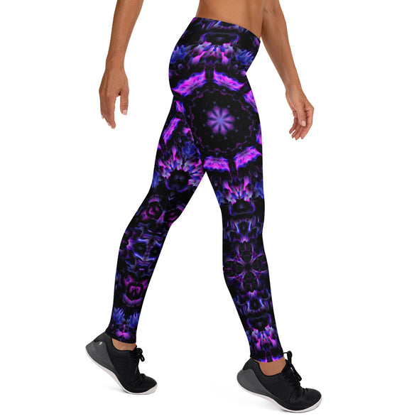 Photograph of a model wearing a unisex Bleace MetaParty Vibes Kaleidoscopic purple, blue, and pink, Trippy Visual leggings in the foreground with a white background