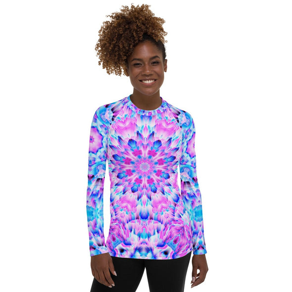 Photograph of a model wearing a unisex Bleace MetaParty Vibes Kaleidoscopic pink, light blue, Trippy Visual Rash guard shirt top.  